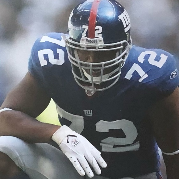 New York football giants Osi sacks Romo. One of the best pics in giants history - Picture 2 of 7